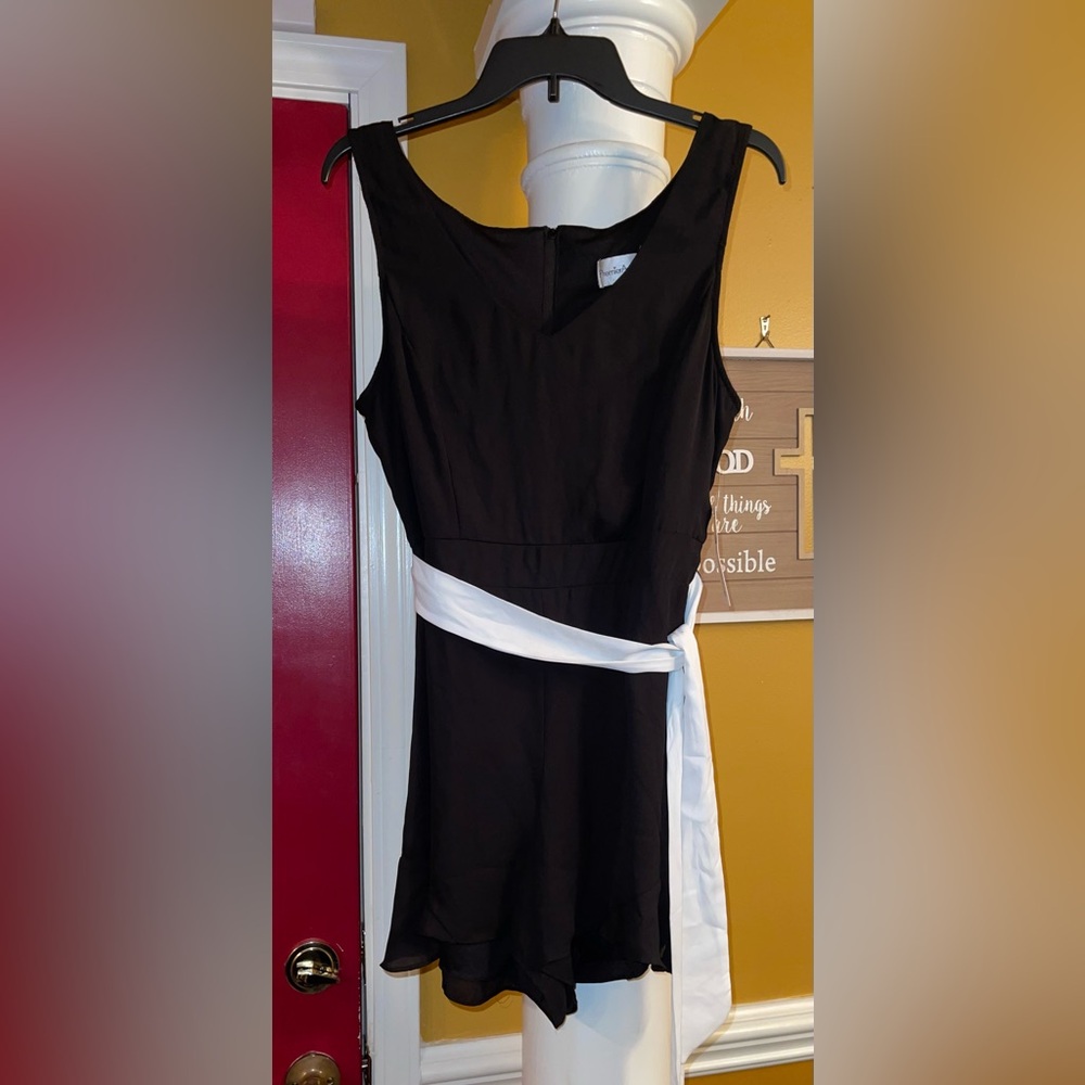 Elegant Black Romper with White Sash